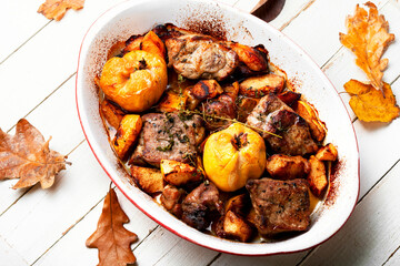 Baked pieces of meat in baking dish
