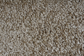Carpet covering background. Pattern and texture of gray colour carpet. Copy space 