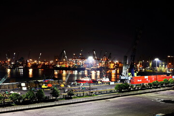 Panoramic night views the pier and terminal of the Port of Surabaya, Indonesia, January,2021