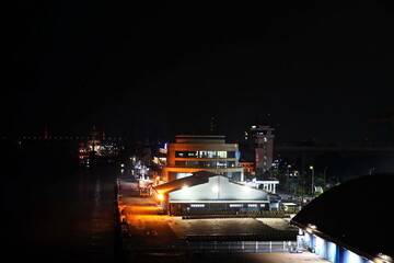 Panoramic night views the pier and terminal of the Port of Surabaya, Indonesia, January,2021