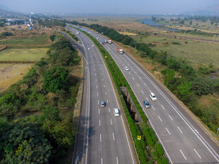 Aerial footage of the Mumbai-Pune Expressway near Pune India. The Expressway is officially called...