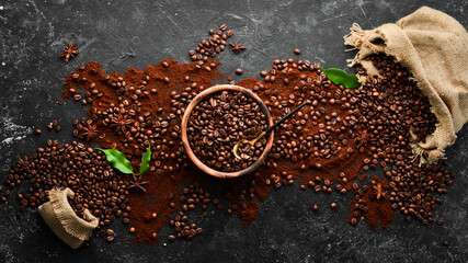 Coffee beans. On a wooden background. Top view. Copy space