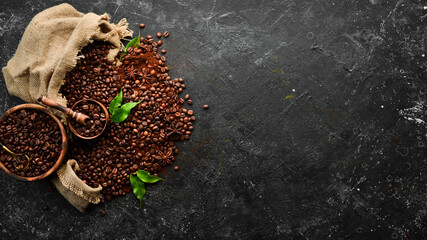 Coffee beans. On a wooden background. Top view. Copy space