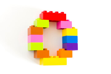 Colorful toy brick letter O