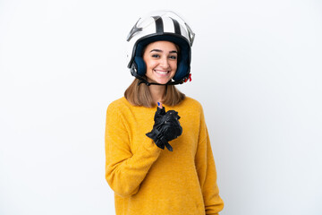 Young caucasian woman with a motorcycle helmet isolated on white background giving a thumbs up gesture