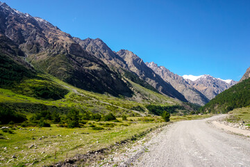 Fototapeta na wymiar Beautiful snow capped mountains of the Caucasus