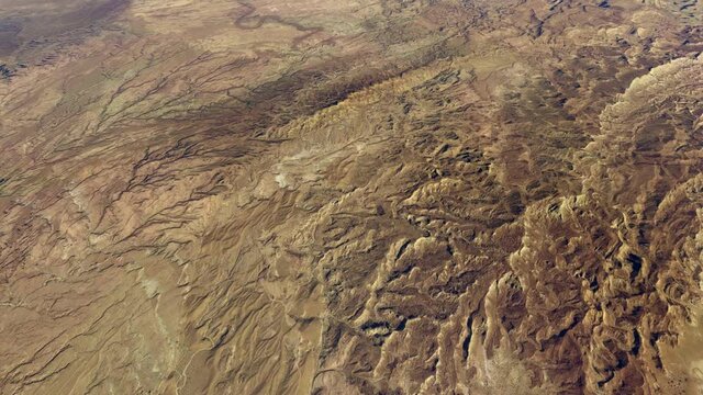 Aerial view of the Lut Desert widely referred to as Dasht-eLut in Persian Emptiness Plain is a large salt-desert located in the provinces of Kerman and Sistan and Baluchestan Iran 4k animation