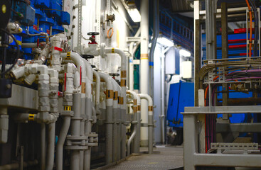 Industrial Piping and valves. Modern Ship interior - Pipe and valve system located inside engine...
