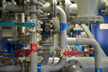 Industrial Piping and valves. Modern Ship interior - Pipe and valve system located inside engine...