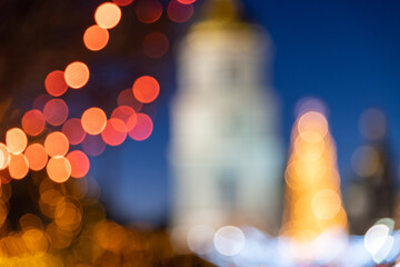 Blurred christmas eve background, illuminated city