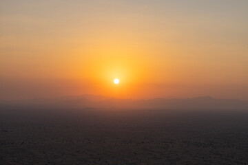 Sunrise over the Arabian Rub' al Khali Empty Quarter desert near Dubai in the United Arab Emirates
