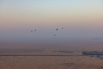 Tourists take the balloon ride over the Arabian desert in the Emirate of Dubai. 