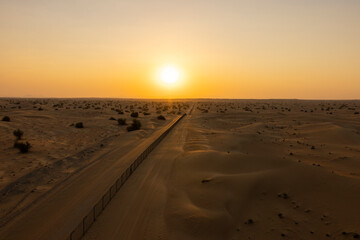 Sunrise over the Arabian Rub' al Khali Empty Quarter desert near Dubai in the United Arab Emirates