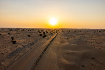 Sunrise over the Arabian Rub' al Khali Empty Quarter desert near Dubai in the United Arab Emirates