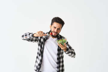 cheerful man in plaid shirt plate with salad healthy food