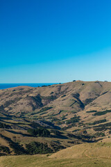 Fototapeta na wymiar ニュージーランド　南島の町、アカロア郊外の丘から望むバンクス半島の風景