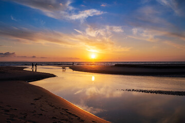 Walking the dog on the beach at sunset, Los Lances beach, Tarifa, C&aacute;diz province, Andalusia, Spain