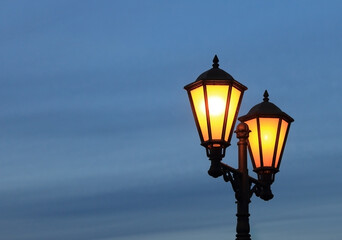 Fototapeta na wymiar Street lamp on the background of the night sky