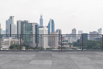 Fototapeta na wymiar Panoramic Kuala Lumpur skyline view, concrete observatory deck on rooftop, daytime. Asian corporate and residential lifestyle. Financial city downtown, real estate. Product display mockup empty roof