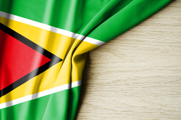 Guyana flag. Fabric pattern flag of Guyana. 3d illustration. with back space for text.