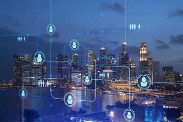 Glowing Social media icons on night panoramic city view of Singapore, Asia. The concept of networking and establishing new connections between people in businesses. Double exposure.