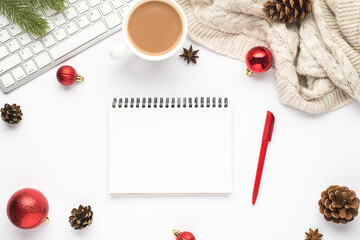 Top view photo of album pen keyboard cup of hot drinking red christmas tree balls pine twig cones anise and cozy sweater on isolated white background with empty space