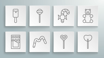 Set line Chocolate bar, Lollipop, Jelly worms candy, Christmas cane, bear and Ice cream icon. Vector