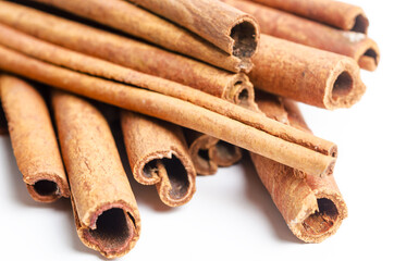Cinnamon sticks on white background