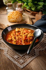 Chicken fricassee with red paprika and onion.