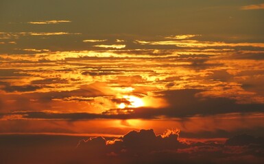 Fiery orange sunset over the city, natural sky background