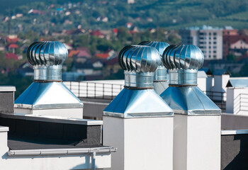 Rooftop no power ventilators . Stainless steel ventilation fan on the roof 