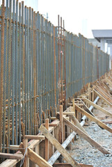 SELANGOR, MALAYSIA -MAY 13, 2016: Hot rolled deformed steel bars or steel reinforcement bars used at the construction site to strengthen concrete. It is shaped to follow the engineer's design.