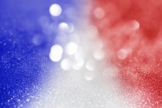 4th of July - USA Independence Day. Blurred view of glitters in colors of American national flag, bokeh effect