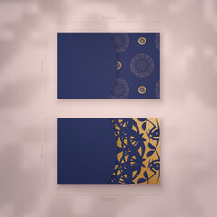 A presentable dark blue business card with a luxurious gold pattern for your contacts.