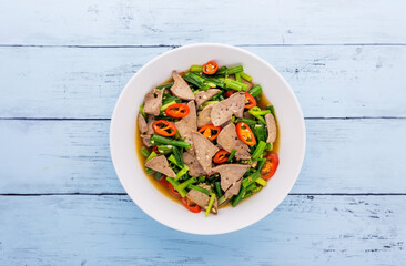 Stir fried onion flower stem with pork liver