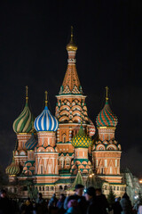 Fototapeta na wymiar Saint Basil Cathedral in Moscow in night. The Saint Basil's Cathedral tonight. Saint Basil's Cathedral on celebration in Moscow in Russia at night in winter with snow. 