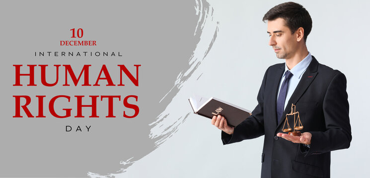 Male lawyer on grey background. International Day of Human Rights