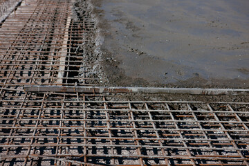 Rebar grids in a concrete floor during a pour