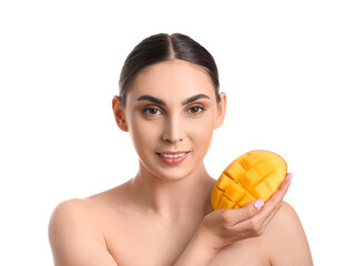 Portrait of beautiful woman with cut mango on white background