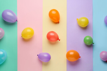 Beautiful balloons on color background