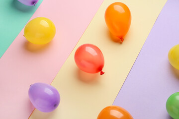 Beautiful balloons on color background