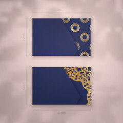 Business card template in dark blue with abstract gold pattern for your brand.