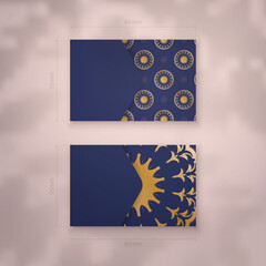 Business card template in dark blue with gold mandala pattern for your personality.