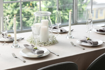 Beautiful table setting for wedding celebration in restaurant