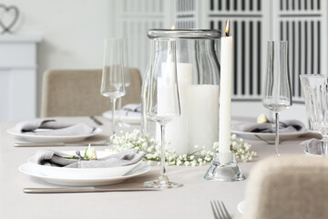 Beautiful table setting for wedding celebration in restaurant