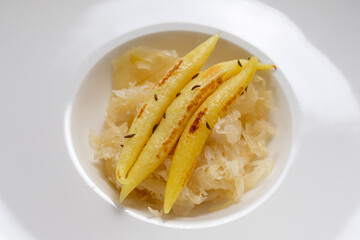 Finger-shaped potato dumplings on Sauerkraut dish