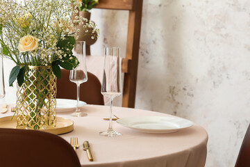 Beautiful table setting for wedding celebration in restaurant