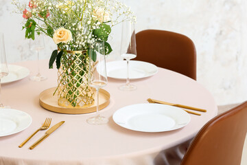 Fototapeta na wymiar Beautiful table setting for wedding celebration in restaurant