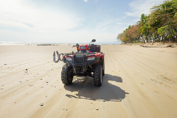 Quad bike on the beach in Costa Rica © Katie Chizhevskaya