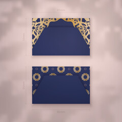 Business card template in dark blue with Greek gold pattern for your contacts.